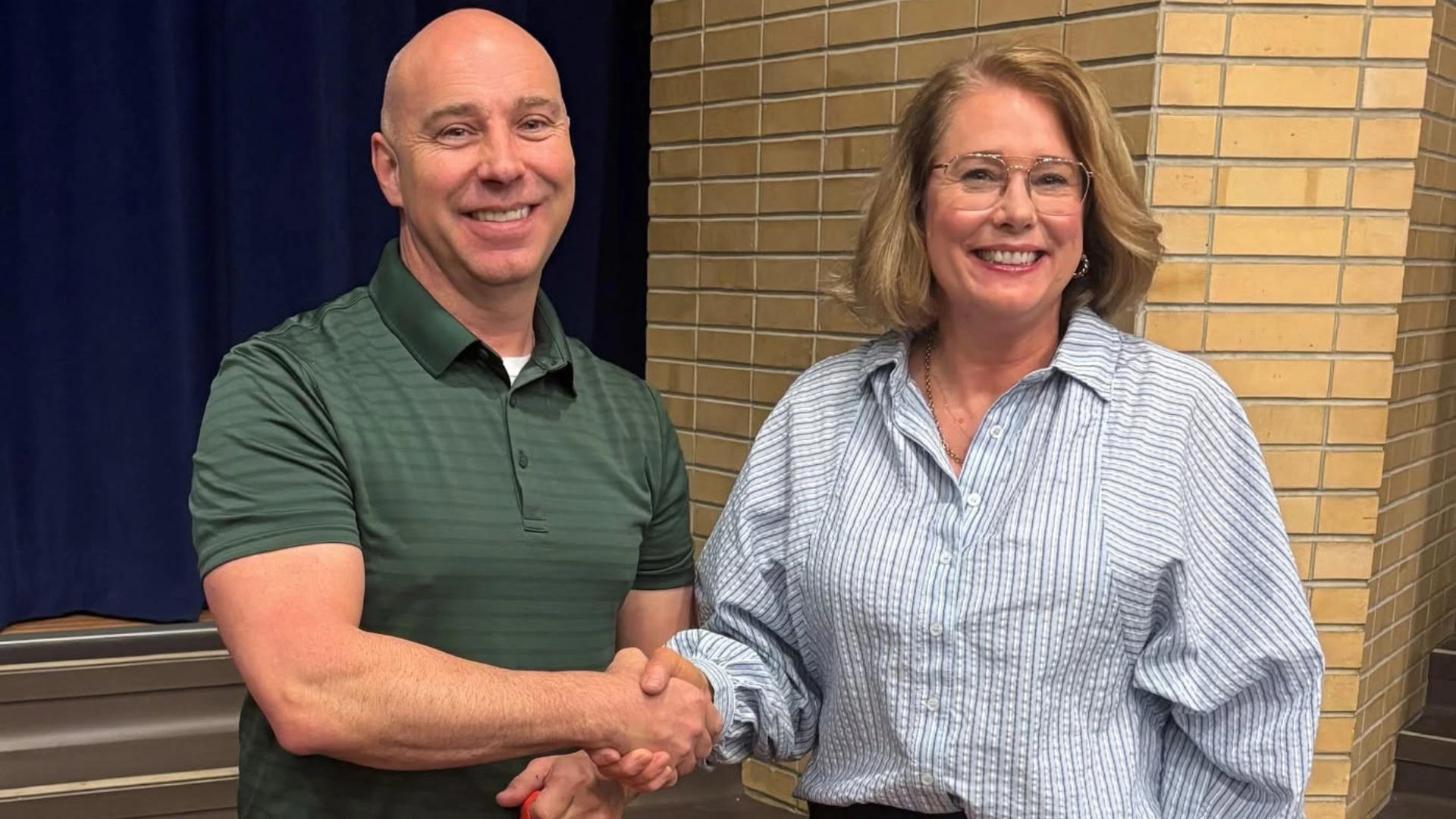 Meeting the teacher who received a grant for educational purposes.