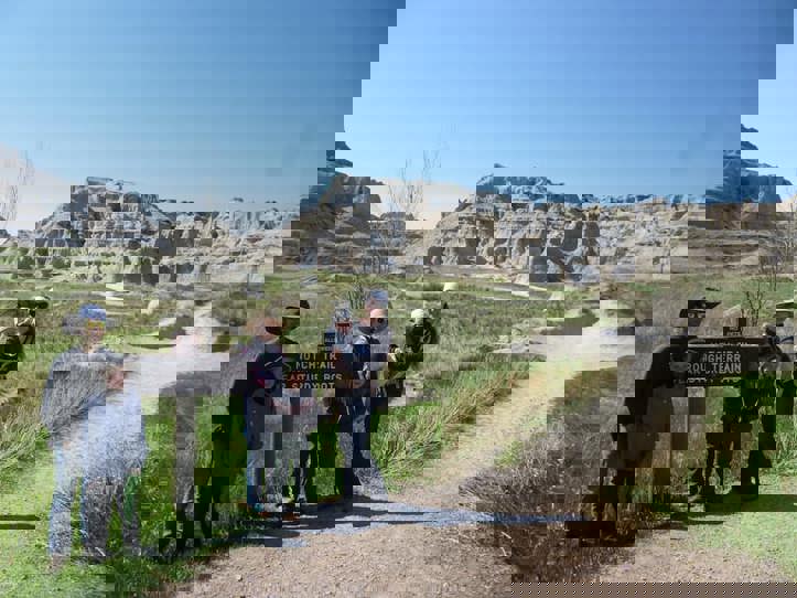 Family hiking through the badlands