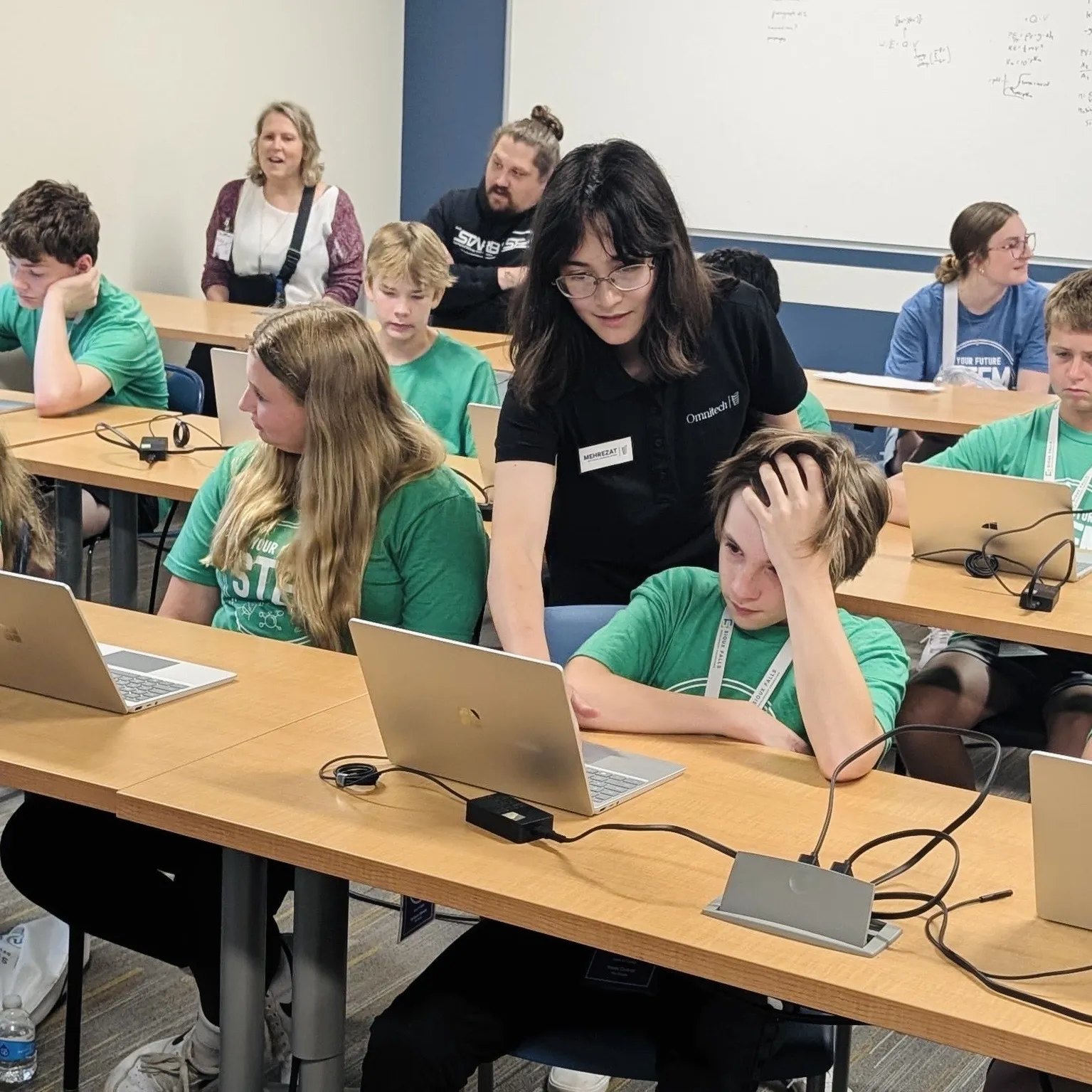 Interns working with students for our session for the Sioux Falls Development STEM Camp