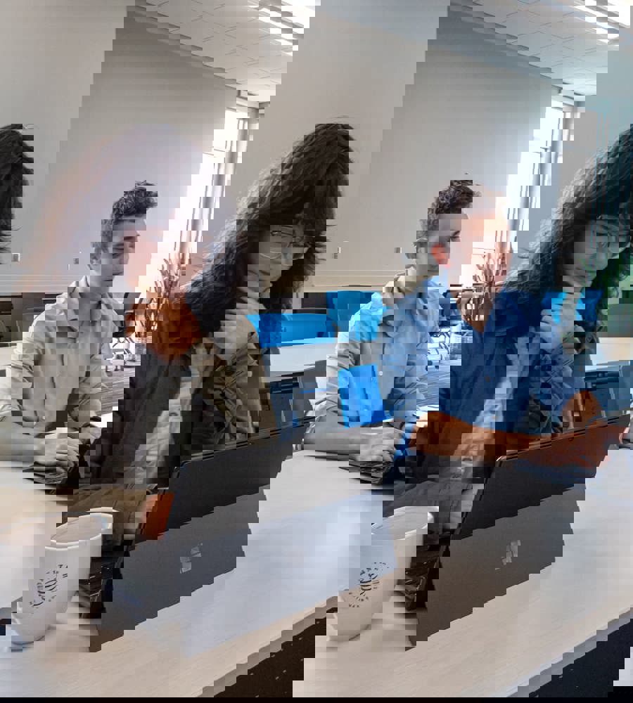 Interns collaborating together in the conference center