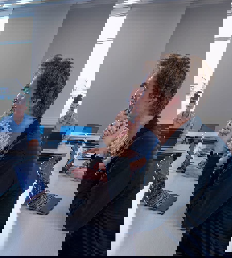 Interns collaborating together in the conference center